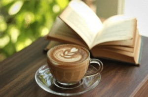 Coffee and book at The Siren and the Sea Coffee and book at The Siren and the Sea