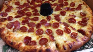 Giant New York-style pepperoni pizza slice at Perri's Pizzeria Pub