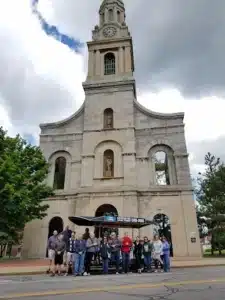 Tour group taking a photo during Rochester Pedal Tours